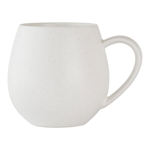 A white, rounded porcelain mug with a handle.