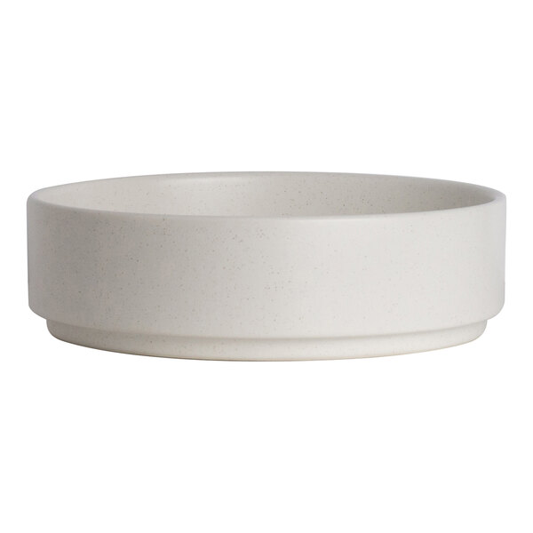 A round, white porcelain stack bowl with a simple, smooth design.