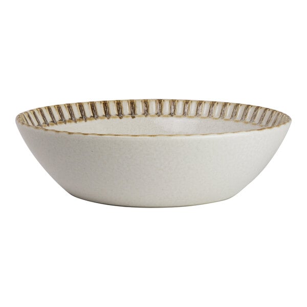 A round birch porcelain bowl with a textured rim, holding 16 ounces.