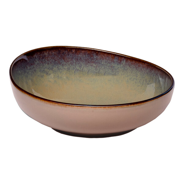 A beige round slanted porcelain coupe bowl with a gradient interior.