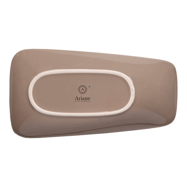 A beige asymmetric rectangular porcelain coupe platter.