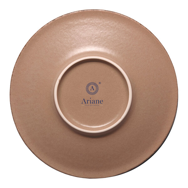 A round, tan porcelain saucer with the Ariane logo on the bottom.