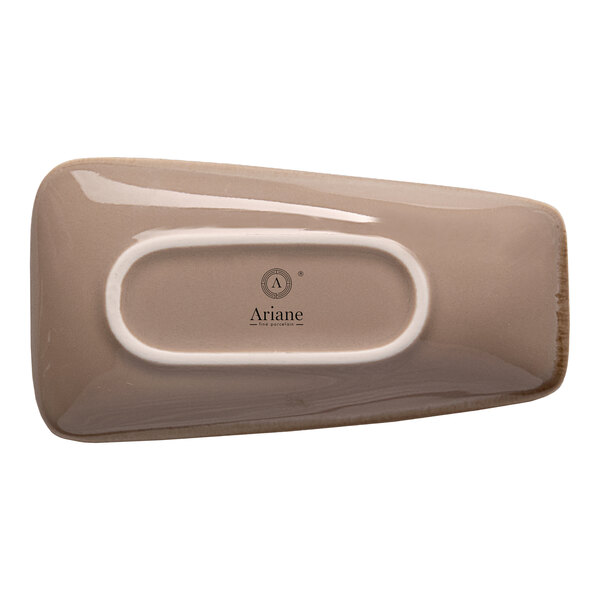 A beige asymmetric rectangular porcelain coupe plate.