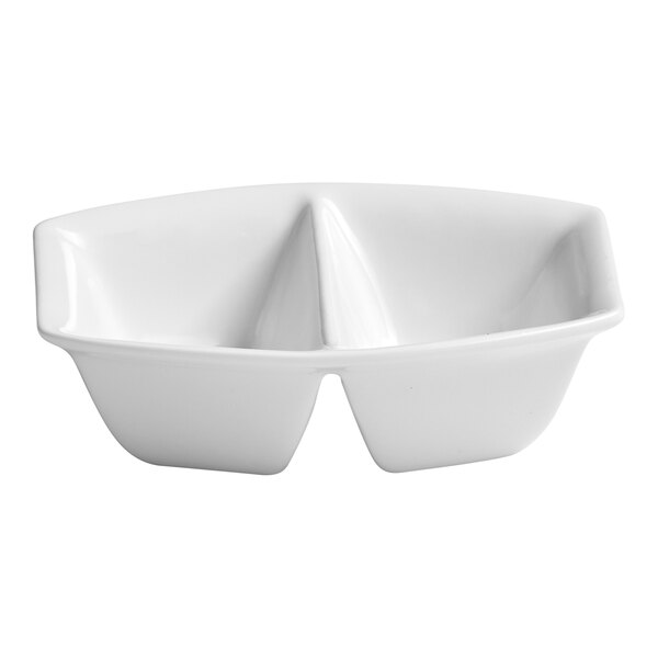 A small ivory rectangular porcelain bowl with two divided compartments.