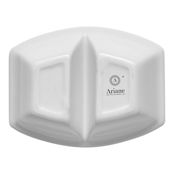 A small ivory rectangular porcelain bowl with two divided compartments.