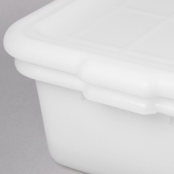 A close up of a white Tablecraft plastic container with a lid.