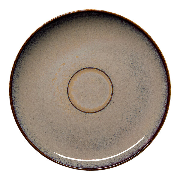 A round beige porcelain coupe saucer with a subtle speckled pattern.