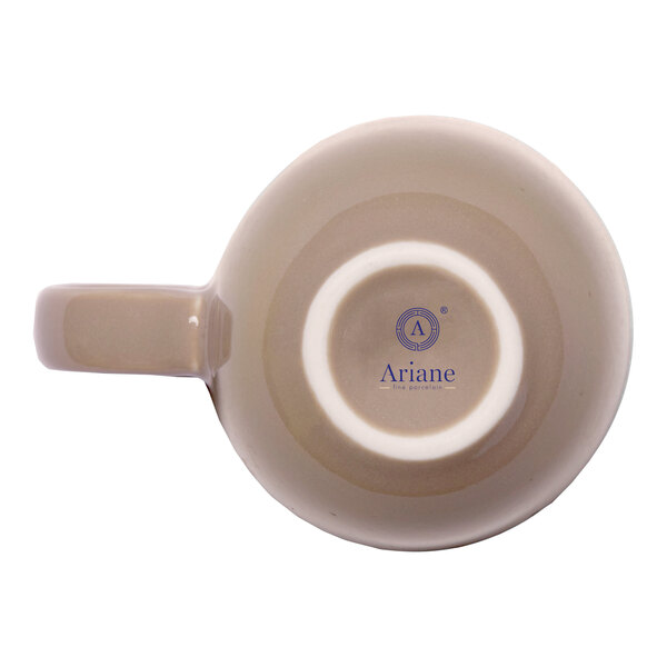 A beige porcelain espresso cup with a handle, viewed from the bottom, featuring the Ariane brand logo.