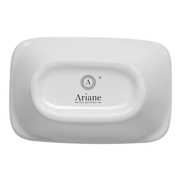 A small ivory rectangular porcelain bowl with a tapered design.