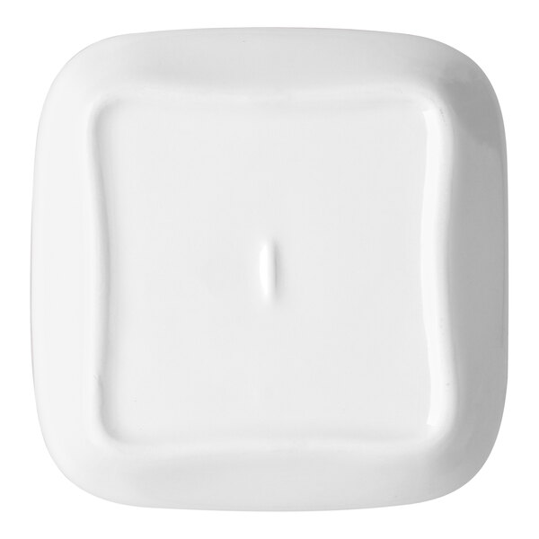 A small square ivory porcelain plate.