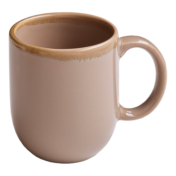 A beige porcelain mug with a rounded shape and a handle.