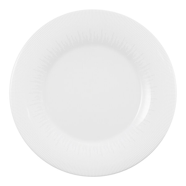 A bright white round porcelain plate with a wide rim and subtle linear pattern.