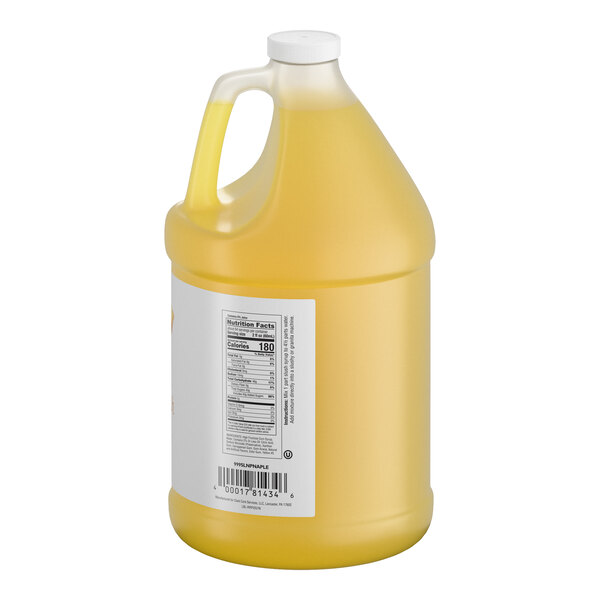 A large, translucent plastic jug filled with yellow liquid and a white cap, featuring a nutrition facts label on the side.