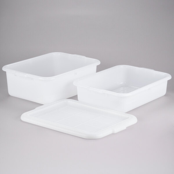 A white Tablecraft plastic drain box combo with a lid on a white surface.