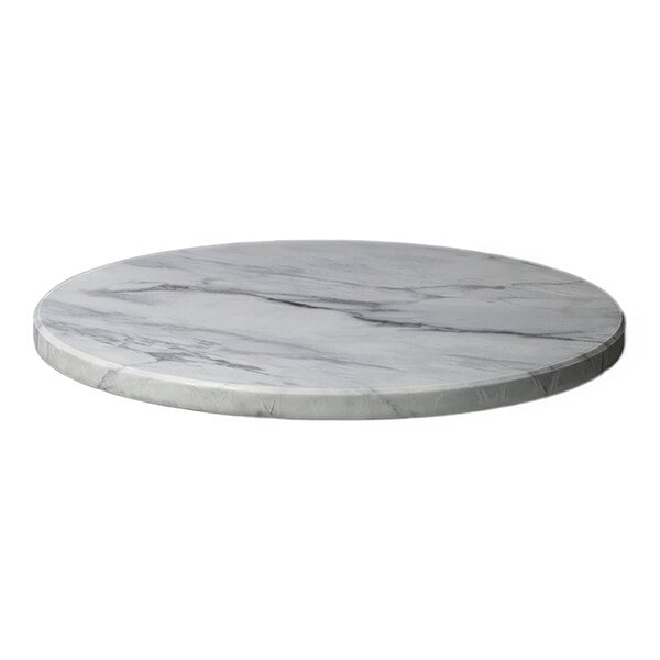 A round, 30-inch indoor table top with a black faux marble finish and eased edge.