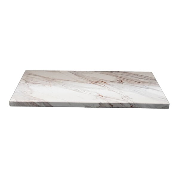 A rectangular indoor table top with a brown Calcatta marble pattern and eased edges.