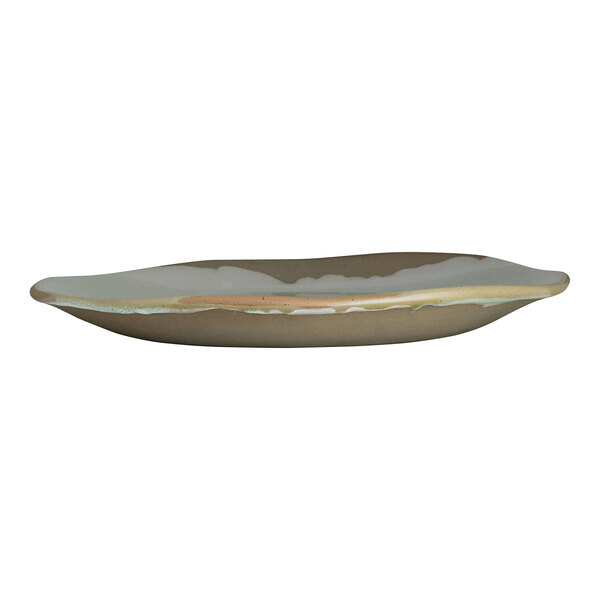 An 11 3/4-inch organic-shaped stoneware plate with a natural, earthy glaze.