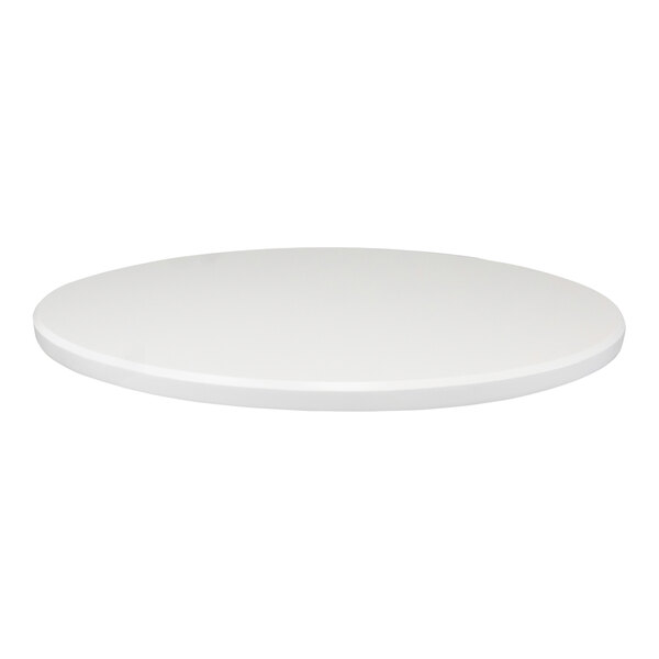 A round, white indoor table top with an eased edge.