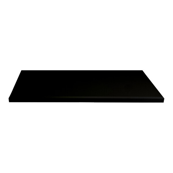 A rectangular frosty black outdoor table top with eased edges and squared corners.