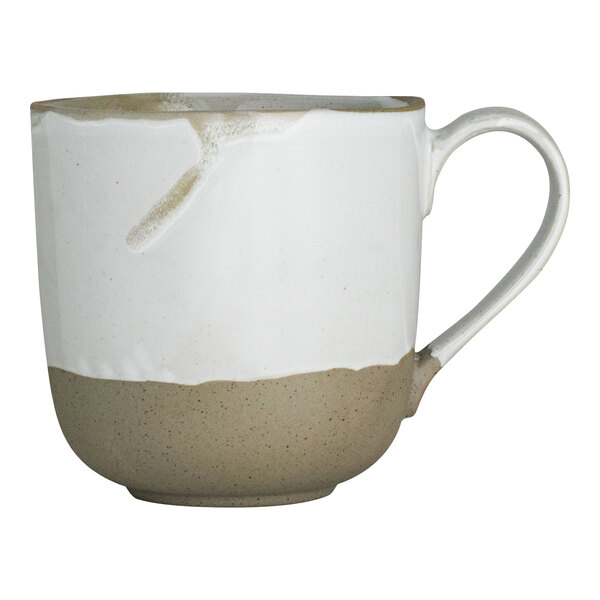 An organic stoneware mug with a natural beige base and a white upper half, featuring a slightly irregular, handcrafted appearance.