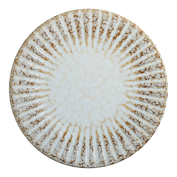 An 8-inch round porcelain coupe plate with a birch-colored, textured, and crackled design.
