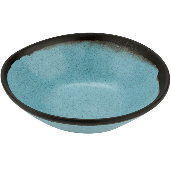 A speckled grayish blue melamine salad bowl with a matte finish and black rim.