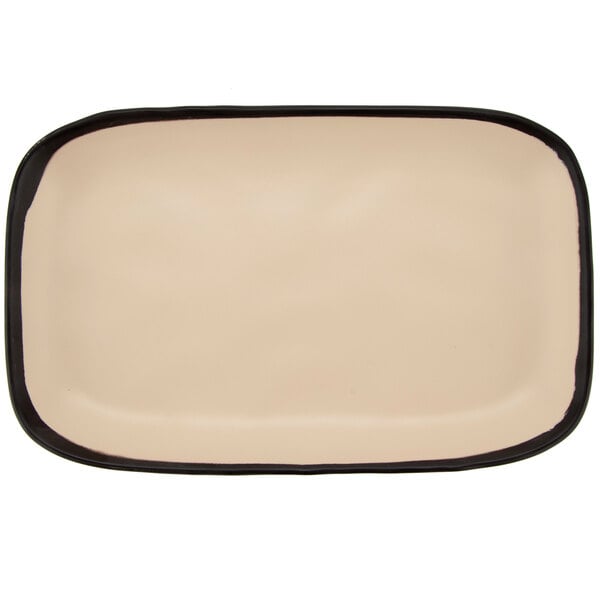 A rectangular beige melamine platter with a dark rim.