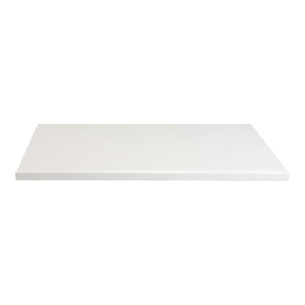 A rectangular white cabinet table top with eased edges and squared corners, measuring 24 by 30 inches.