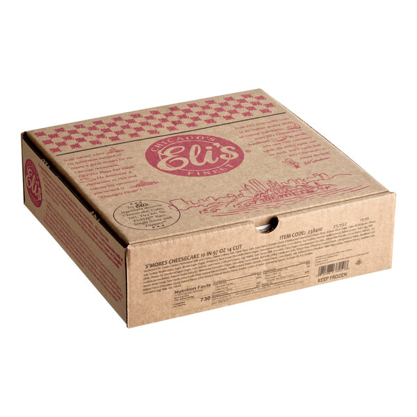 A cardboard box containing Eli's Cheesecake 10-inch pre-cut S'mores cheesecake.