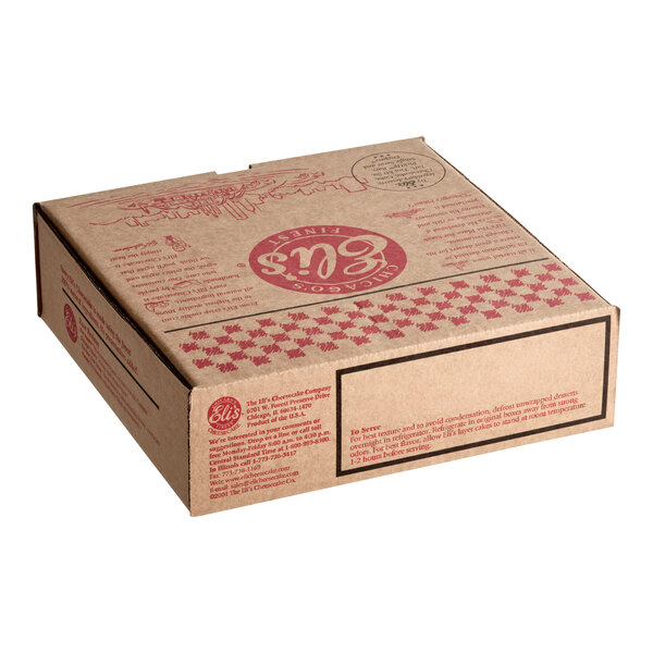 A closed cardboard box containing Eli's Cheesecake, labeled for a 10-inch pre-cut S'mores cheesecake.