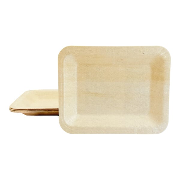 A stack of rectangular birch wood plates.