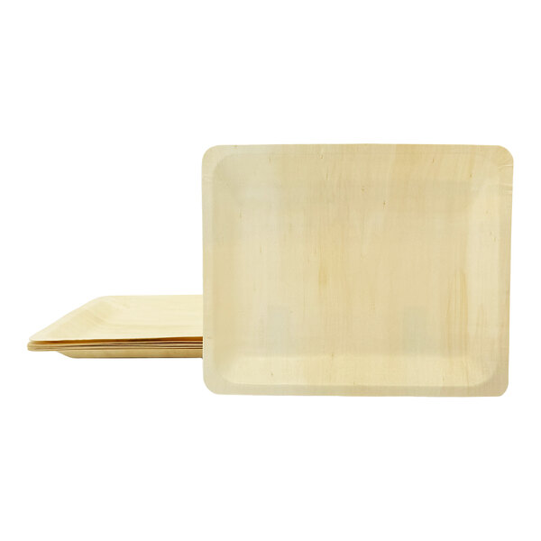 A stack of rectangular birch wood plates with rounded corners.