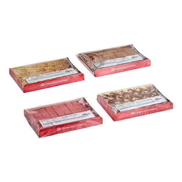 A set of four pre-cut cheesecake trays in assorted flavors, each wrapped in plastic packaging.