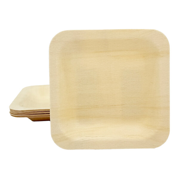 A stack of square birch wood plates with rounded corners.