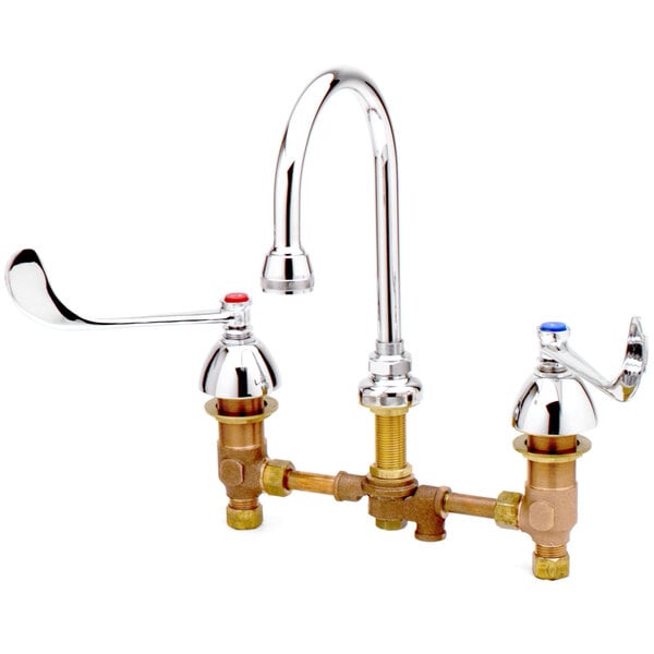 A chrome T&S deck mount medical faucet with two gooseneck faucets and wrist action handles.