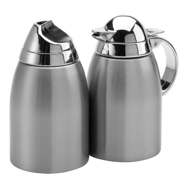 A stainless steel creamer and sugar set with a modern design, including an 8 oz. creamer and sugar container.