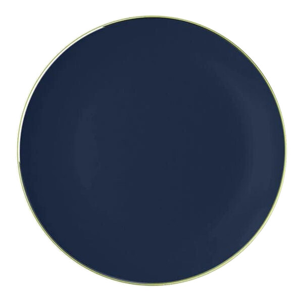 A navy round plastic plate with a gold band around the edge.