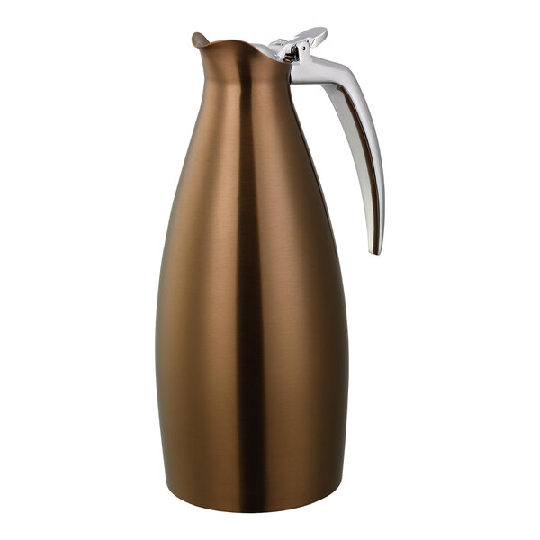 A rose gold stainless steel insulated coffee carafe server with a silver handle.