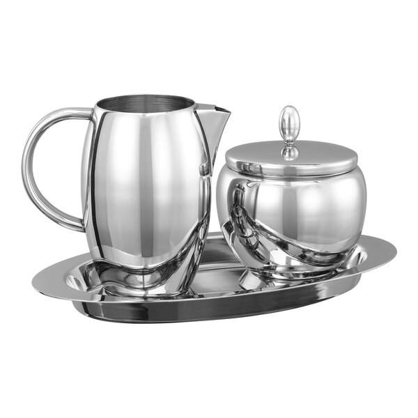 A polished stainless steel cream and sugar set with a tray.
