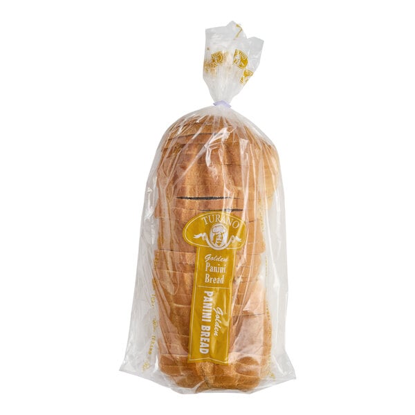 A loaf of Turano sliced golden panini bread in a clear plastic bag.