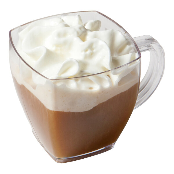 A clear square plastic disposable coffee mug filled with coffee and topped with whipped cream.