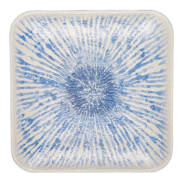 A square light blue melamine plate with a radiating sunburst pattern.