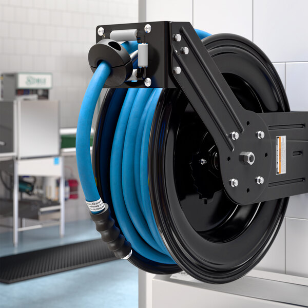 A black powder-coated steel open hose reel with a 30-foot blue air or water hose mounted on a wall.