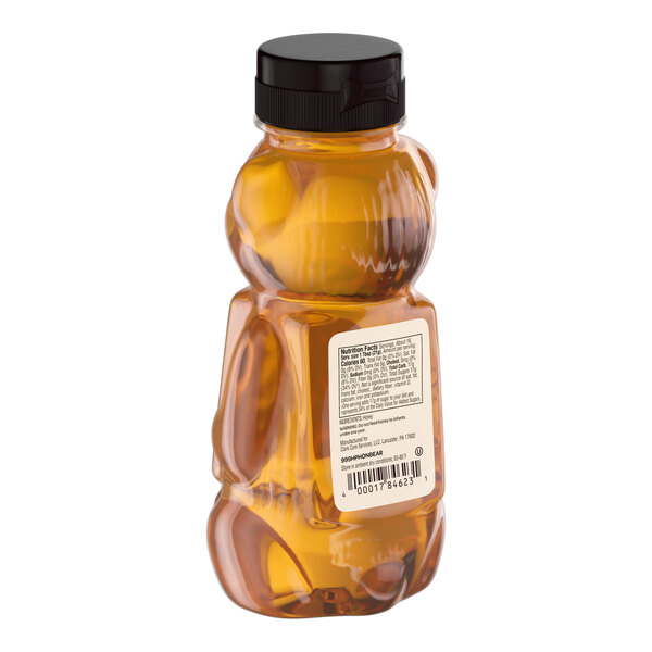 A 12 oz. bear-shaped squeeze bottle filled with all-natural amber honey.