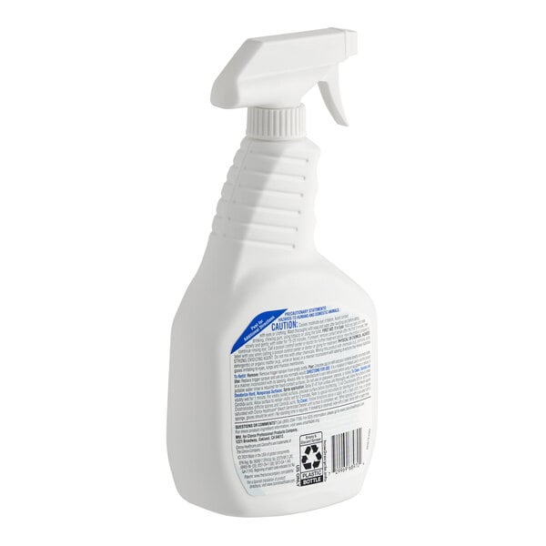 A white plastic spray bottle of Clorox Healthcare bleach germicidal cleaner.