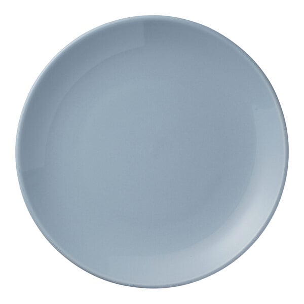 A round, light blue porcelain coupe plate.
