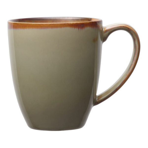 A sage green porcelain mug with a brown rim and handle.