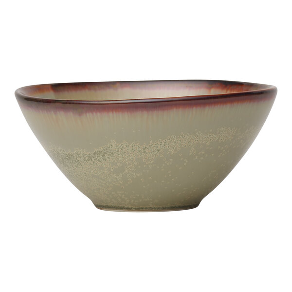 A sage green porcelain bowl with a subtle textured pattern and a reddish-brown rim.