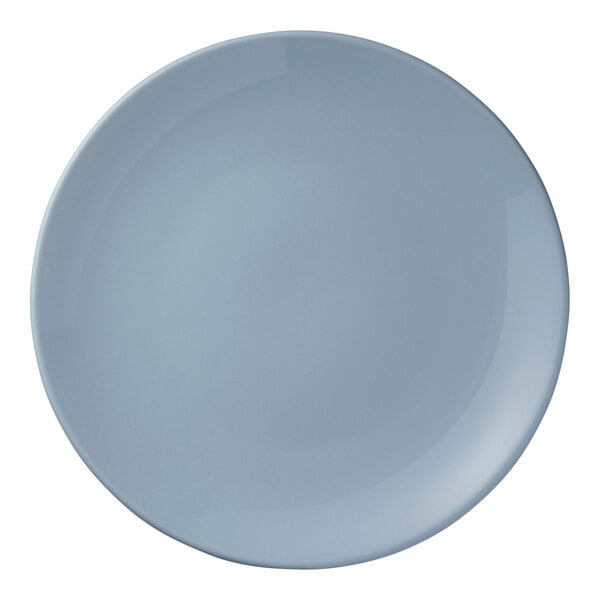 A round, light blue porcelain coupe plate.