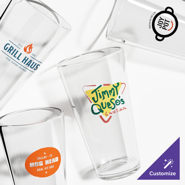 A set of clear Acopa 20 oz. mixing glasses with customizable printed logos.